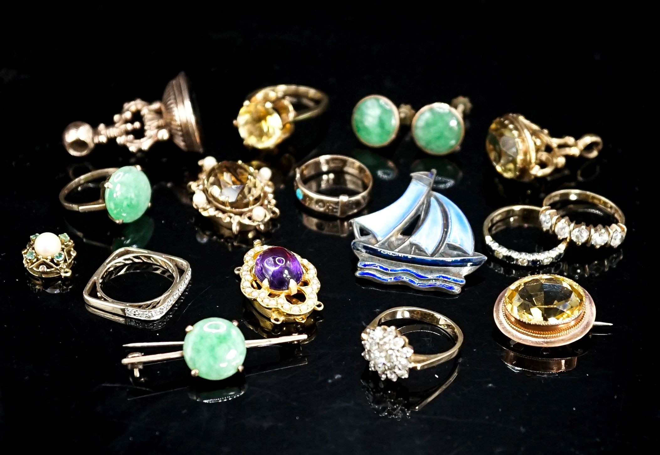 Mixed jewellery including 14k ring, 9ct ring, enamelled white metal yacht brooch, citrine set clasp citrine brooch, amethyst set clasp etc.